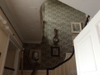 Apart from the lovely harp on the landing, this stairwell is enhanced by original William Morriss (1834-1896) wallpaper.