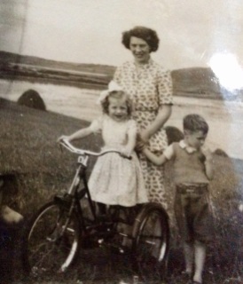 Di, her son Gerry and me on my red trike at the point of Figart c.1953 (thesilvervoice)
